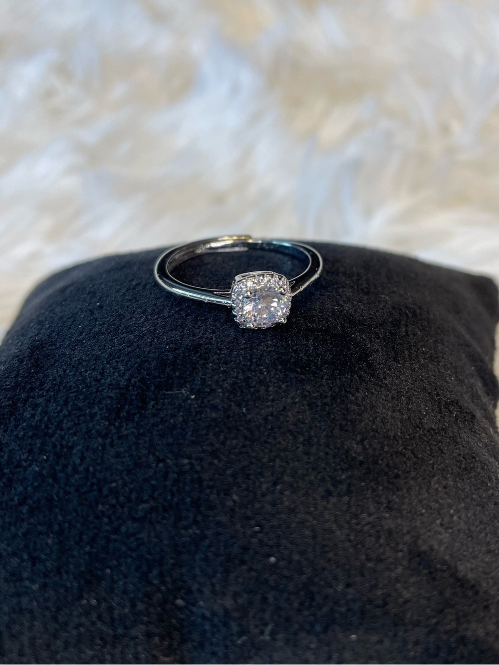 Dazzling Silver Toned Ring with Clear Center Stone